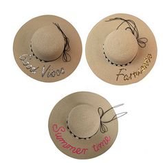 Capeline avec message paillettes