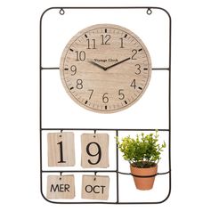 Décoration murale horloge, calendrier et plante artificielle 34x51.8cm